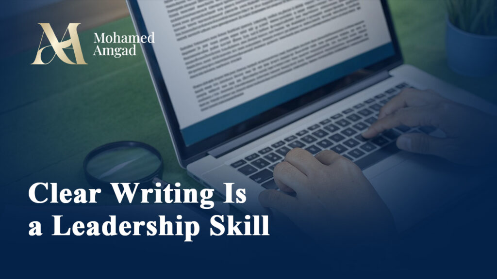 Clear writing is a leadership skill – article cover showing a professional writing on a laptop